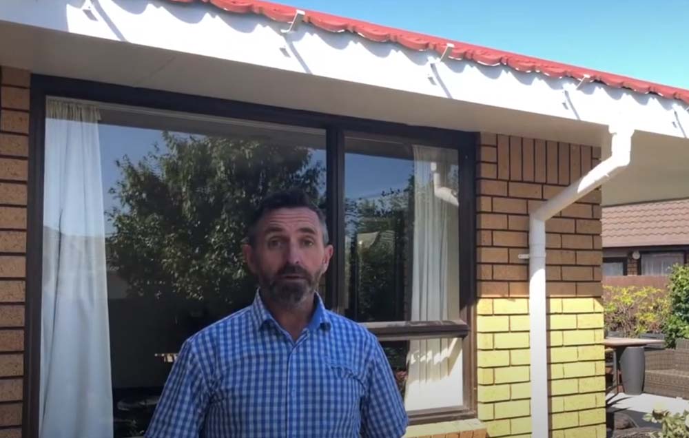 Expert from Clearwater Spouting explaining entire box gutters to external gutters conversion