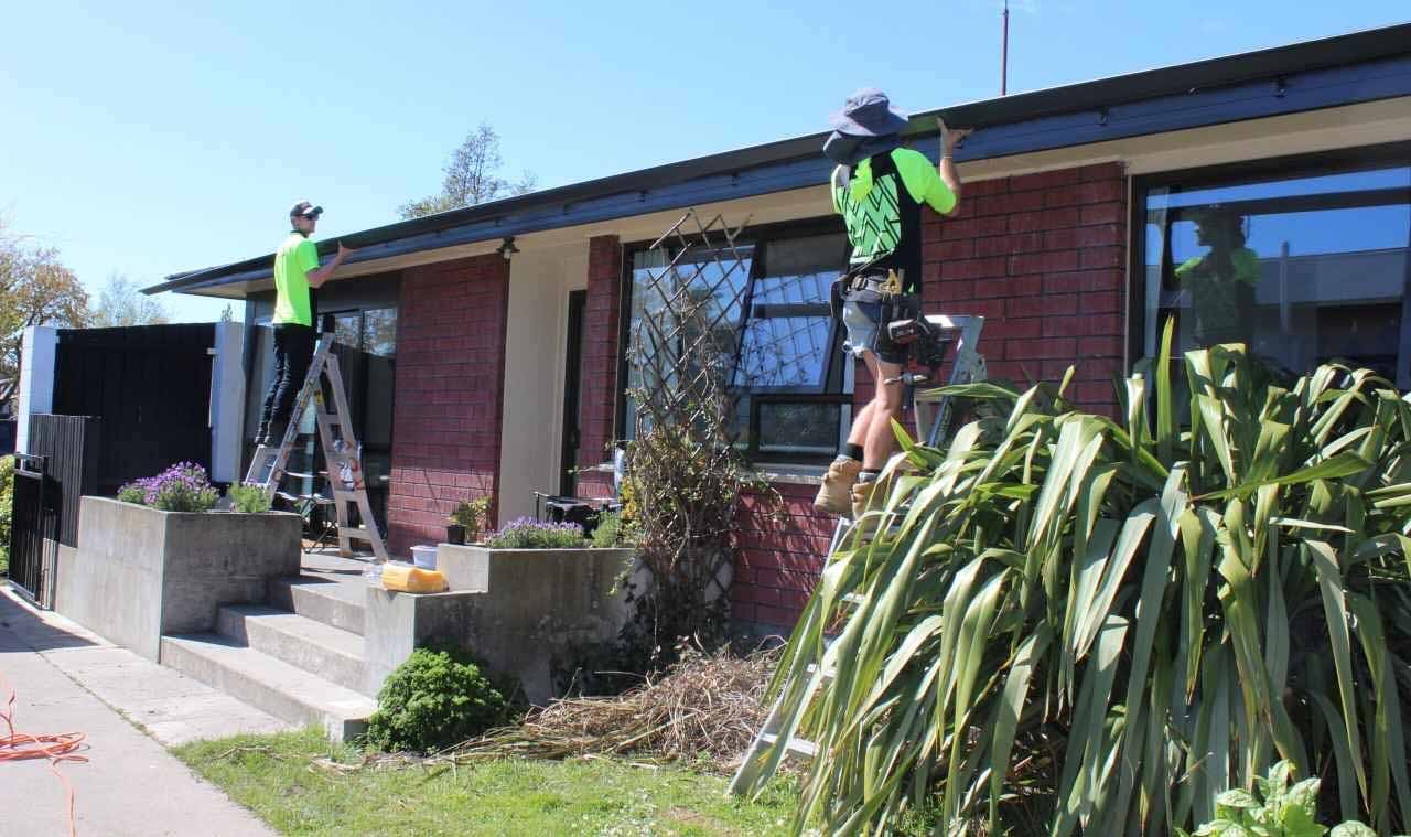 Clearwater Spouting team installing custom fascia and spouting on a Christchurch home