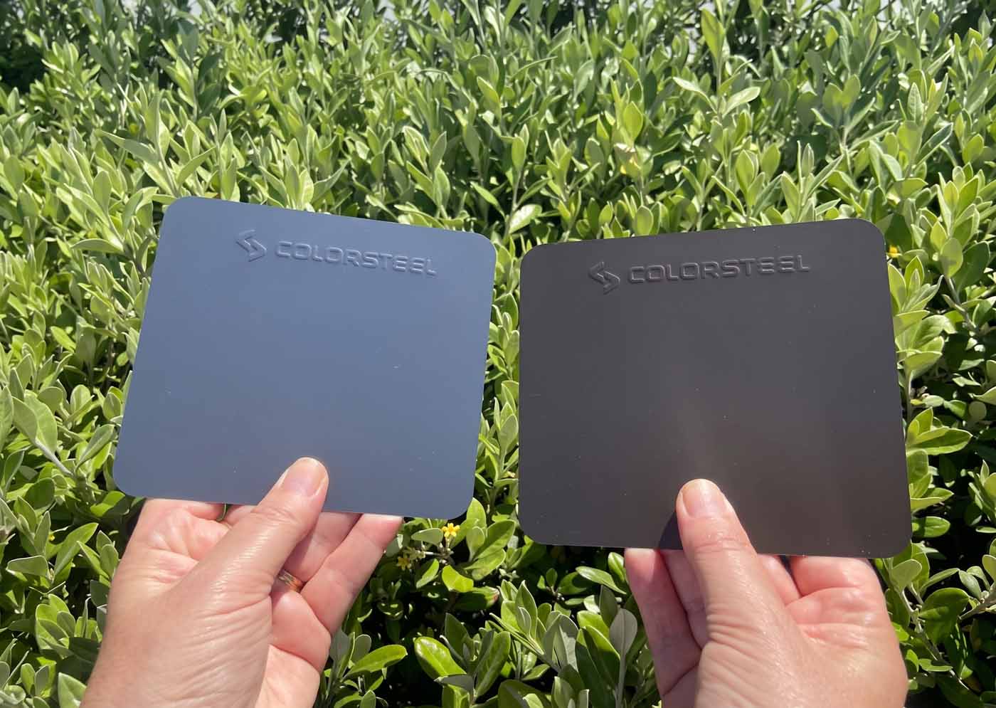 COLORSTEEL® colour samples being compared outdoors for Christchurch spouting selection